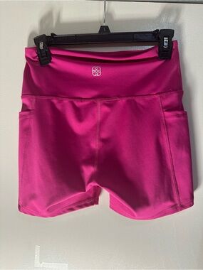 Daisy Fuentes, pink shorts
